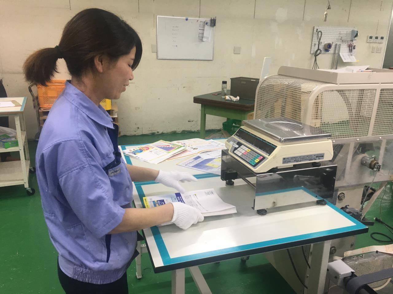 印刷物加工と検査業務